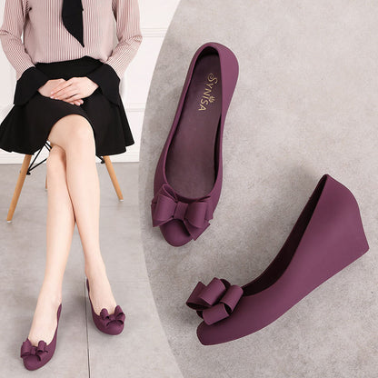 Fashionable women’s bowknot wedge heel jelly shoes Purple