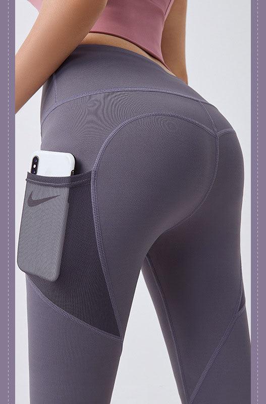 Women's fitness leggings with pockets Purple